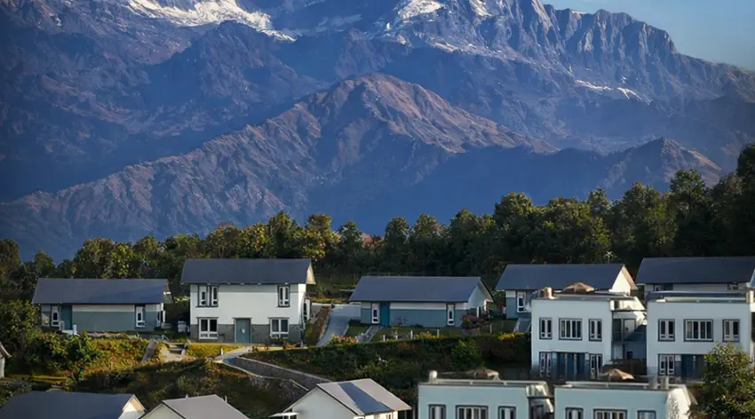 Himalayan Hideaway resort buildings with mountain backdrop
